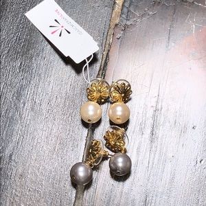 Three sets or pear dangly earrings